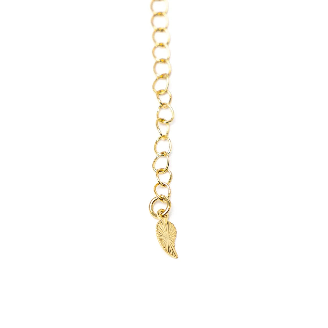 Halsband med sex ädelstenar och lotushänge